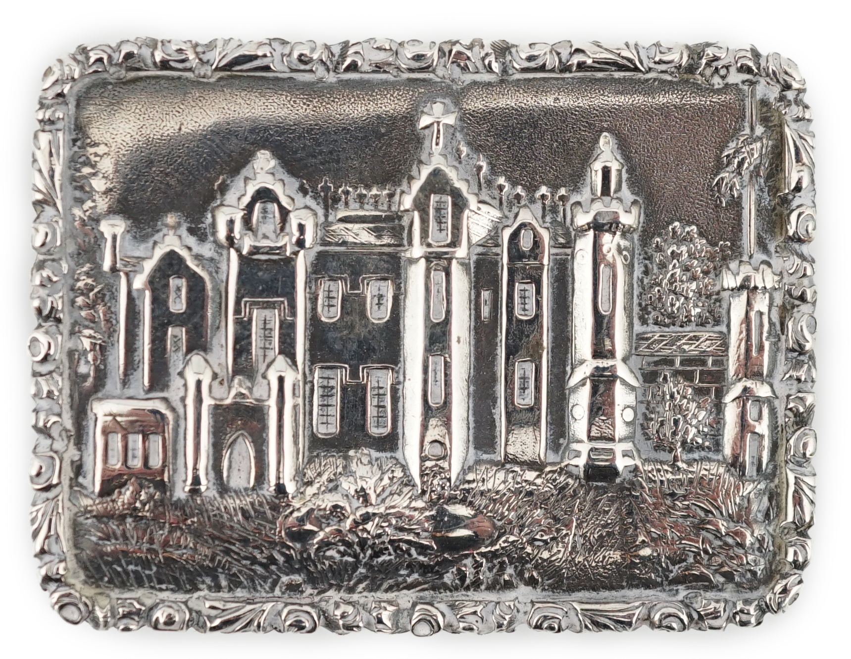 An early Victorian silver rectangular 'castle top' vinaigrette, depicting Abbotsford House, by Edward Smith